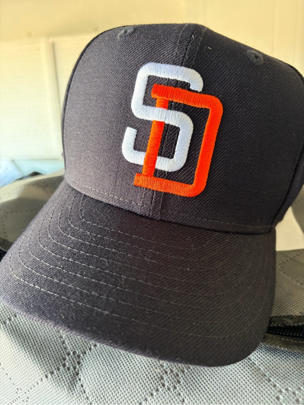 New Era Black SlHat with Orange & White SD Logo